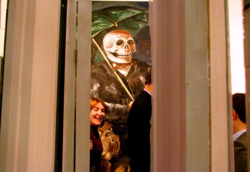 Death is in the Air: Skulls always loom large at art fairs. Here, a smiling rendition with umbrella lords over passersby in Galerie Zink's space at the Armory.